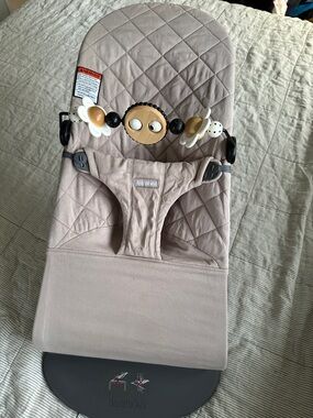 BabyBjorn Beige Quilted Baby Bouncer with Decorative Toy Bar